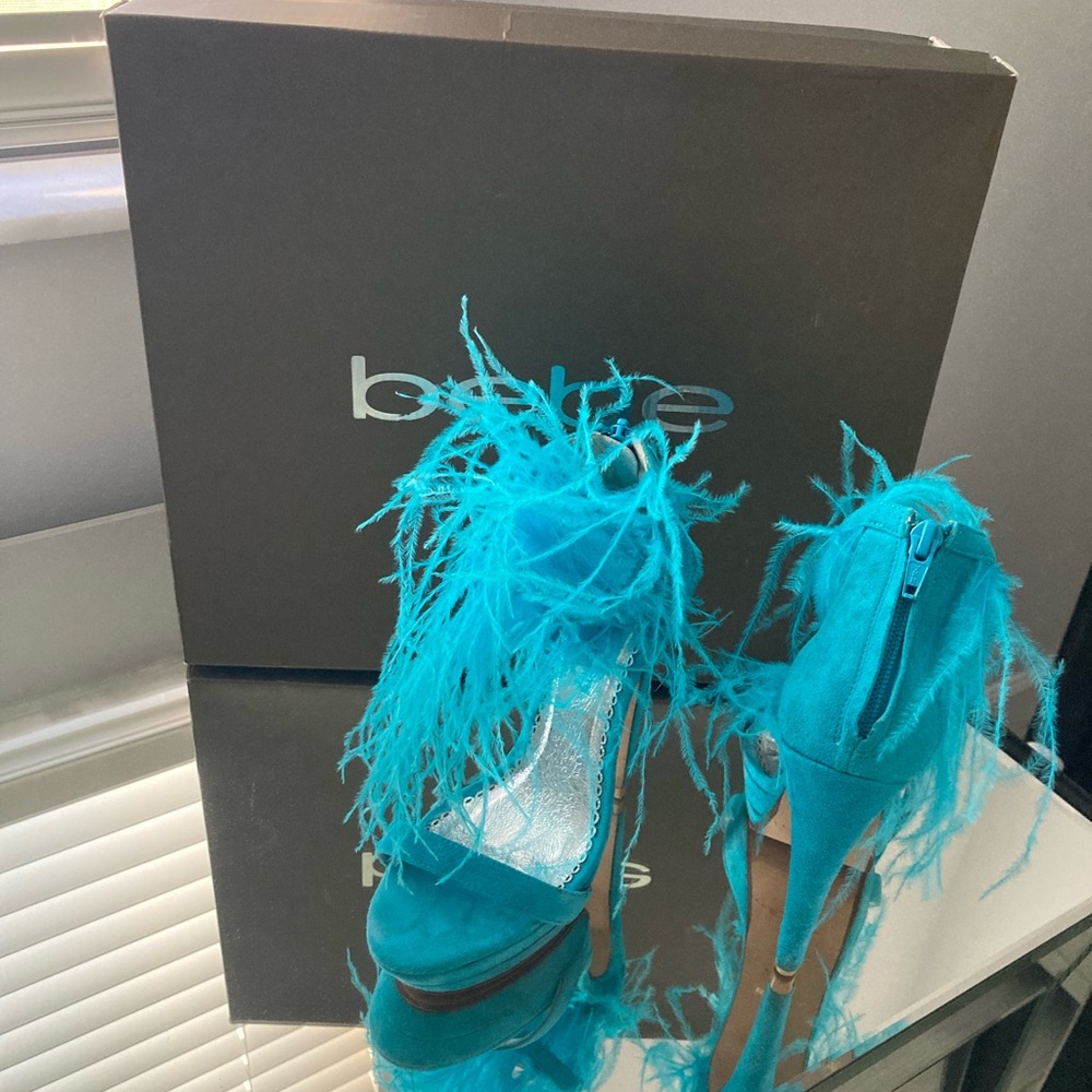 Turquoise with feathers, high heels